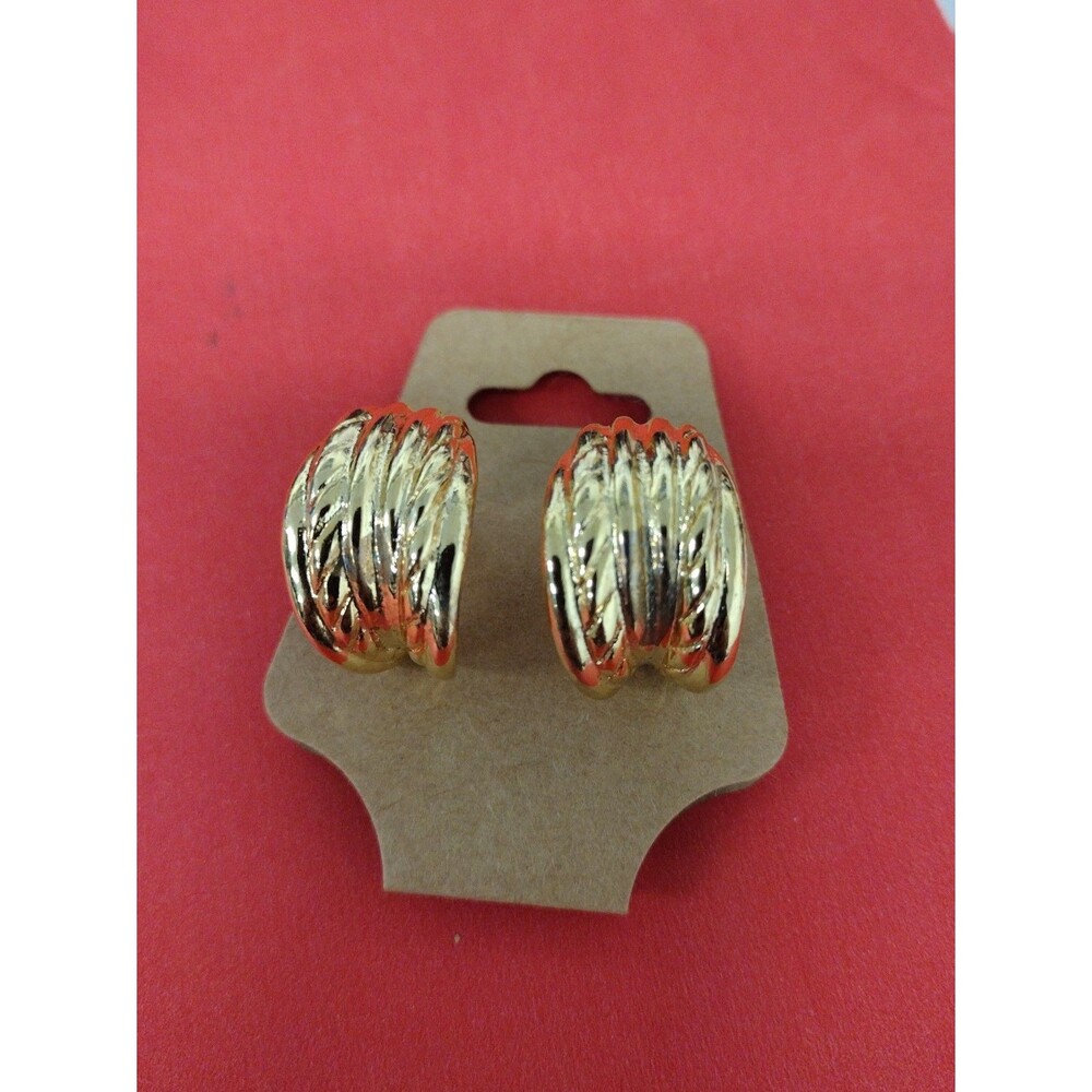 Thick, ridged gold tone hoop earrings